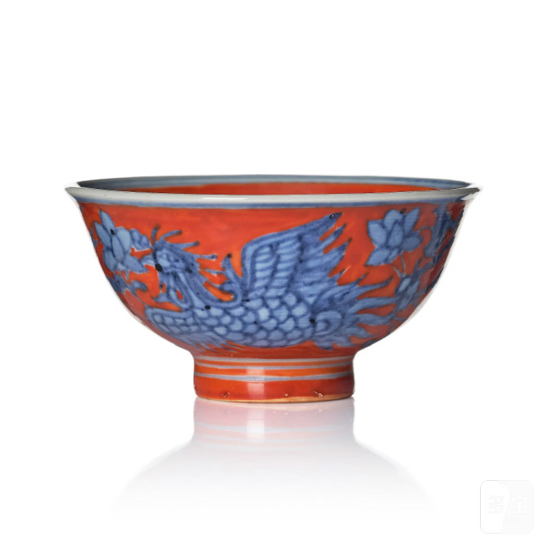 A small blue and white phoenix cup,